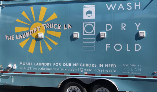 (2020) KCRW Press Play “Laundry Truck LA helps homeless people stay clean, DOLAN clothing company sews free masks amid coronavirus”